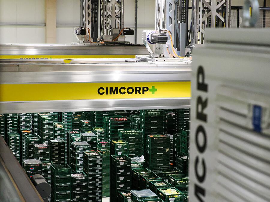 Cimcorp overhead gantry robots automating fresh produce handling at Edeka Freienbrink's distribution center near Berlin, Germany.