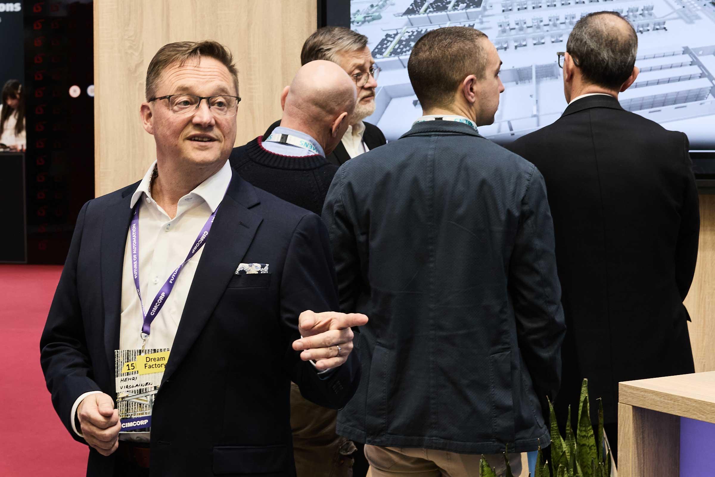 Tire Technology Expo expo at Germany, people at Cimcorp Group booth